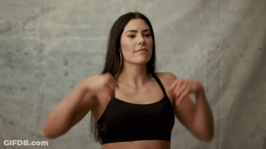 Kelsey Plum Showing Off Her Arm Muscles GIF