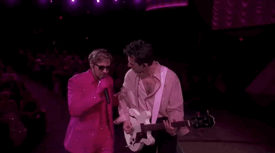 Ken Ryan Gosling Singing Playful Punch GIF