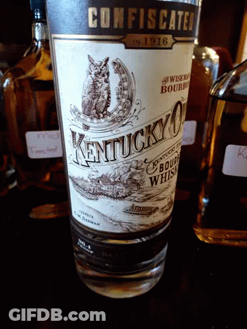 Kentucky 10 Bourbon Whiskey Bottle With Cat Label GIF