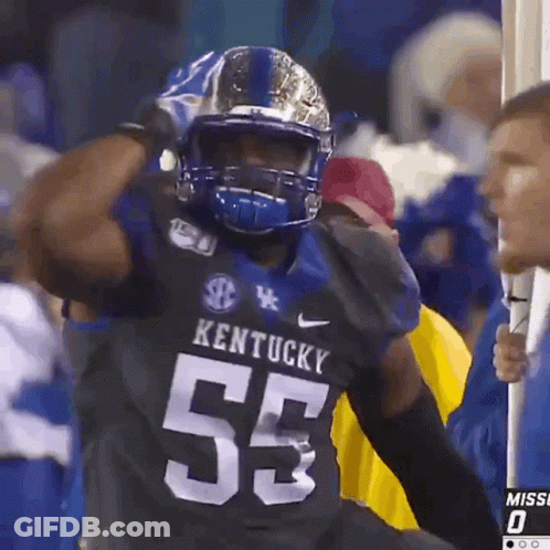 Kentucky Football Player Wearing Helmet And Gloves GIF