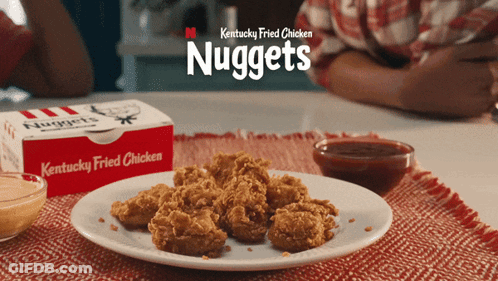 Kentucky Fried Chicken Nuggets Next To Plate GIF