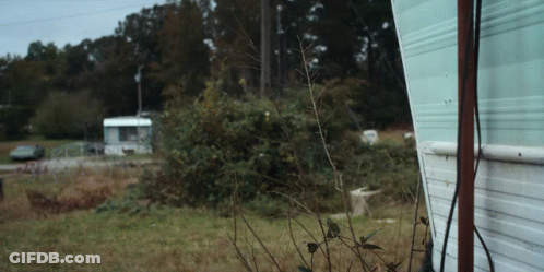 Kenworth Semi Truck Driving Down Road GIF