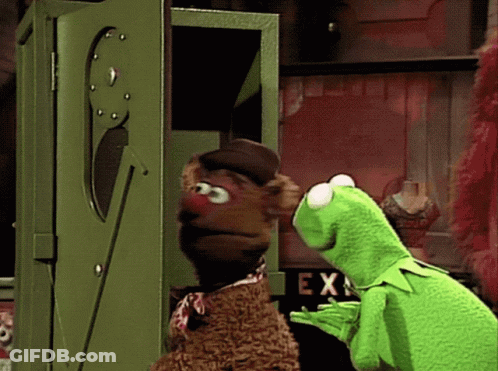 Kermit The Frog And Fozzie Bear Are Looking Out Of A Green Box GIF