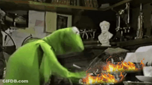 Kermit The Frog Is Cooking Something In A Frying Pan GIF