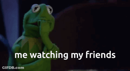 Kermit The Frog Is Covering His Mouth With His Hand While Watching His Friends GIF
