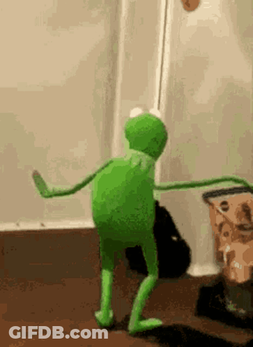 Kermit The Frog Is Dancing In A Room With A Bag Of Chips In The Background . GIF