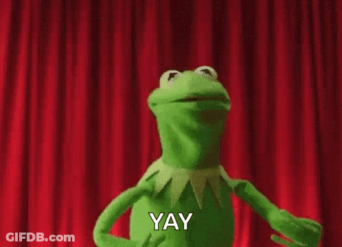 Kermit The Frog Is Dancing On Stage In Front Of A Red Curtain And Saying Yay . GIF