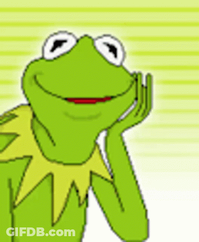 Kermit The Frog Is Smiling And Looking At The Camera . GIF
