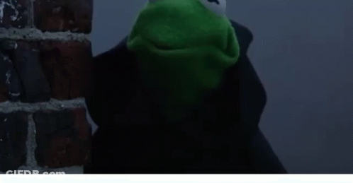 Kermit The Frog Is Standing Next To A Brick Wall With The Words It 'S Not Easy Being Mean Below Him GIF