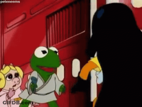 Kermit The Frog Is Standing Next To Miss Piggy And A Black Penguin . GIF