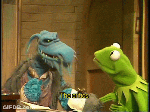 Kermit The Frog Is Talking To A Blue Monster With The Words The Critics Below Him GIF