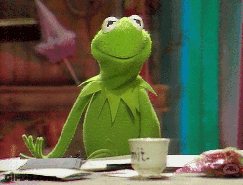 Kermit The Frog Sitting At Table With MIT Cup GIF