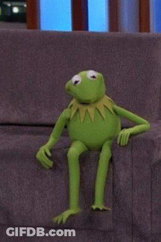 Kermit The Frog Sitting On Couch Looking Up GIF