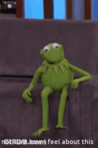 Kermit The Frog Sitting On Couch Not Sure How I Feel GIF