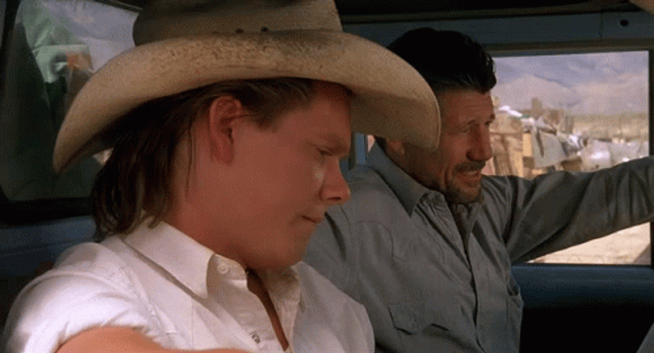 Kevin Bacon And Fred Ward Intense Gaze GIF