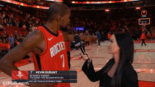 Kevin Durant Is Being Interviewed By A Reporter During A Basketball Game GIF