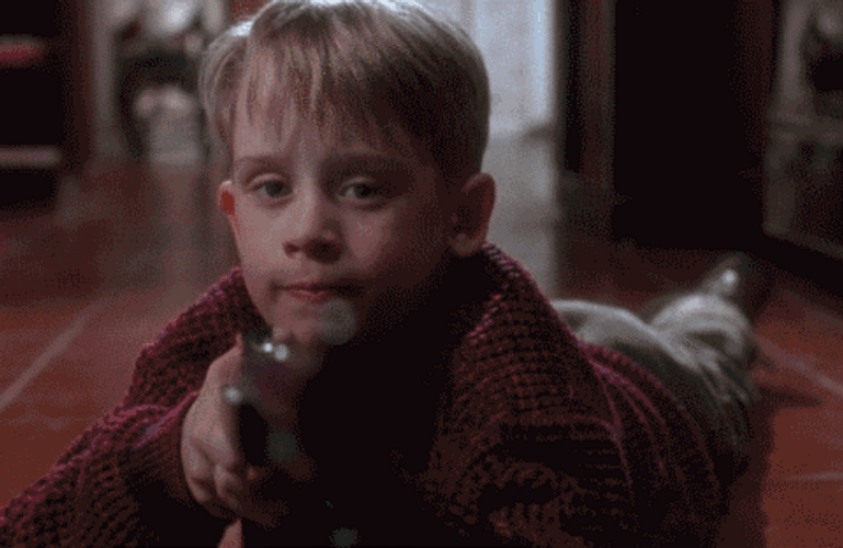 Kevin Firing Toy Gun At Home Alone GIF