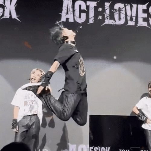 Kevin Gates Jumped Holding Feet GIF