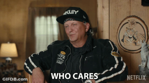 Key Hat Man Black Jacket Says Who Cares GIF