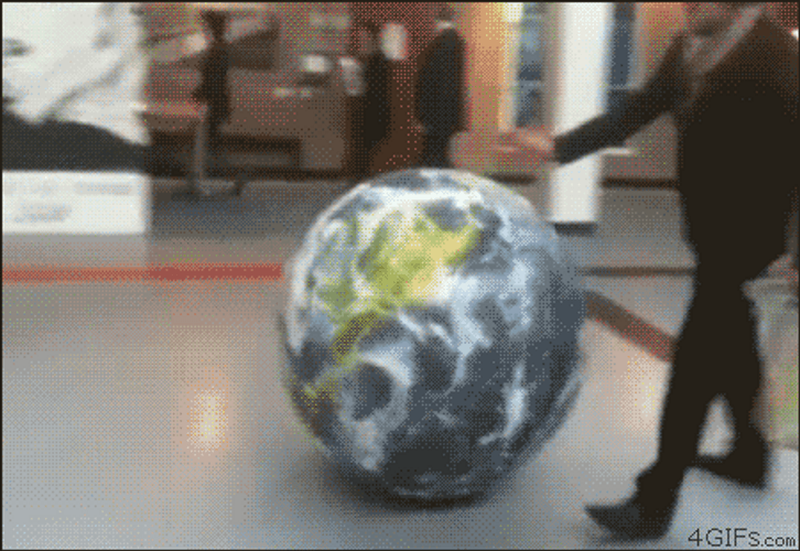 Kicking World Globe GIF