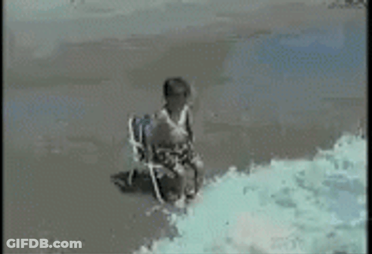 Kid Approaches Blue Wave GIF