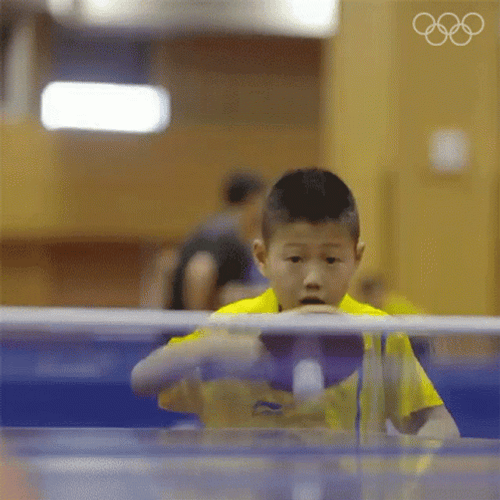 Kid Boy Playing Ping Pong GIF
