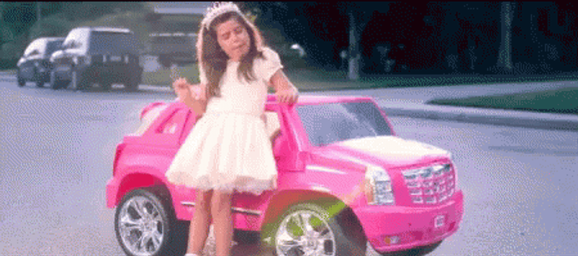 Kid Dancing Beside Toy Jeep GIF
