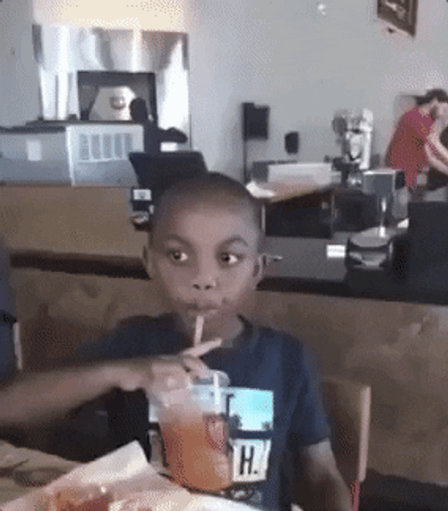 Kid Drinking Juice Saying No! GIF