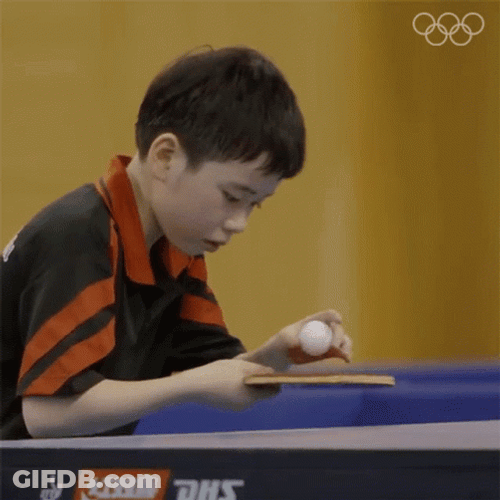 Kid Focus Playing Table Tennis GIF