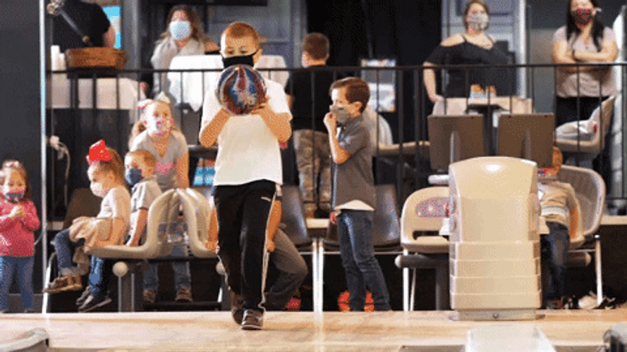 Kid Hitting All The Bowling Pin GIF
