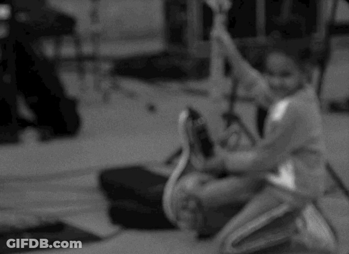 Kid Holding A Guitar GIF