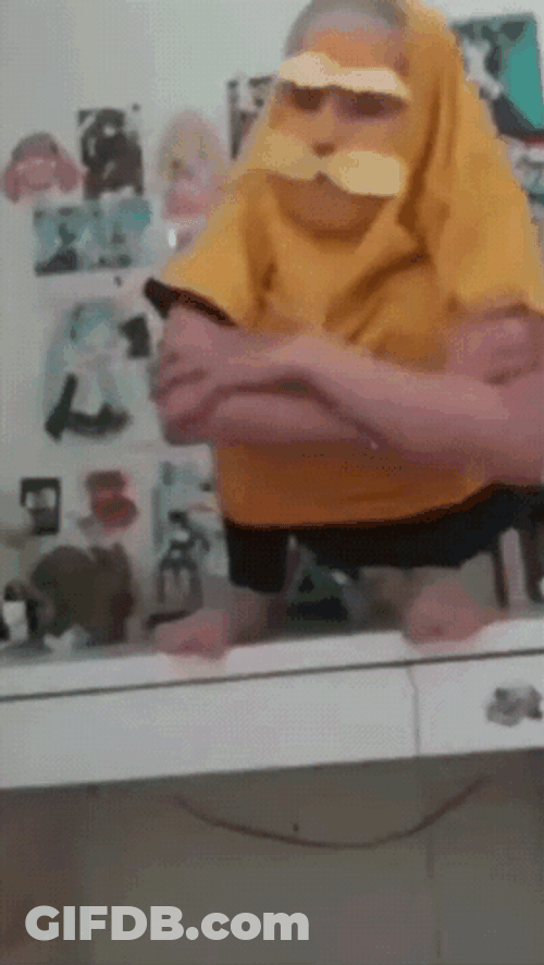 Kid Mimicking Dr. Seuss' The Lorax Or Onceler GIF
