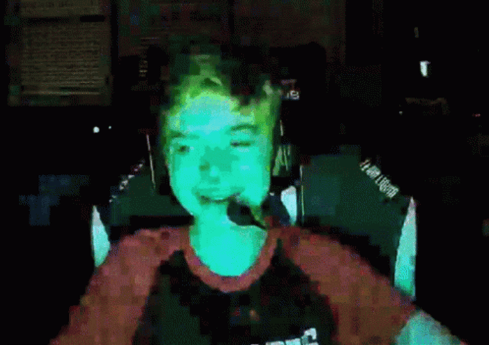 Kid On A Computer Flashing Colors GIF