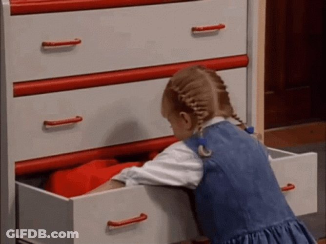 Kid Packing Bags GIF