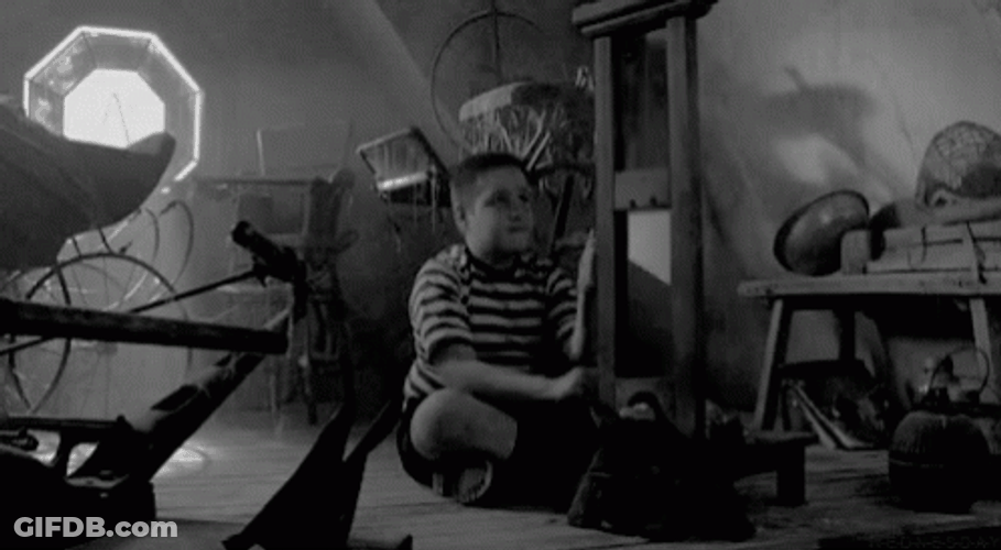 Kid Playing With A Guillotine GIF