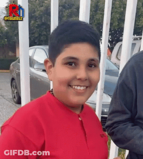 Kid Suspicious Smiling Mmm GIF