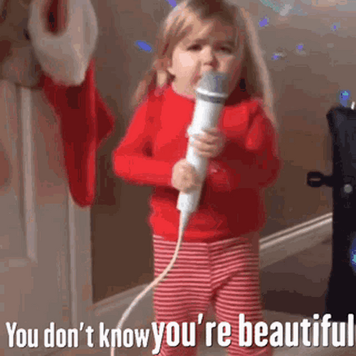 Kid With Mic Singing GIF