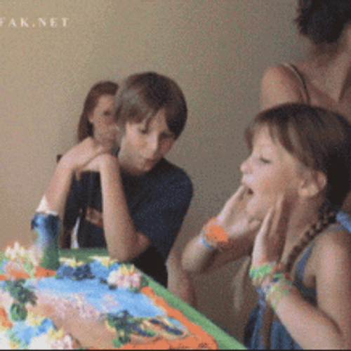 Kid’s Face Smashed At Cake GIF