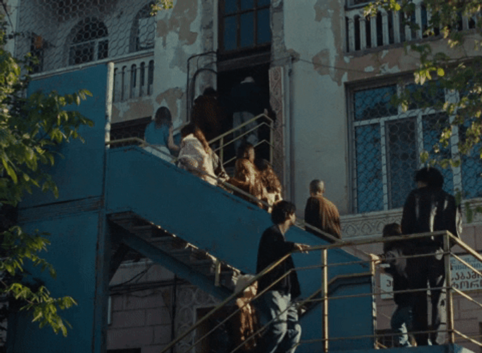 Kids Going Up Tall Building Walking City GIF