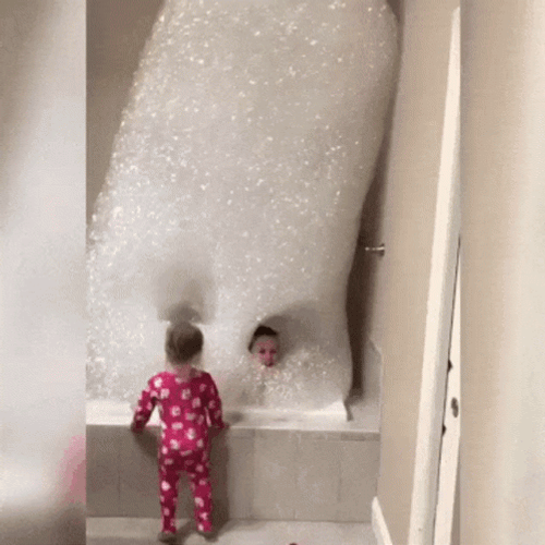 Kids In Bath Tub Huge Bubbles GIF