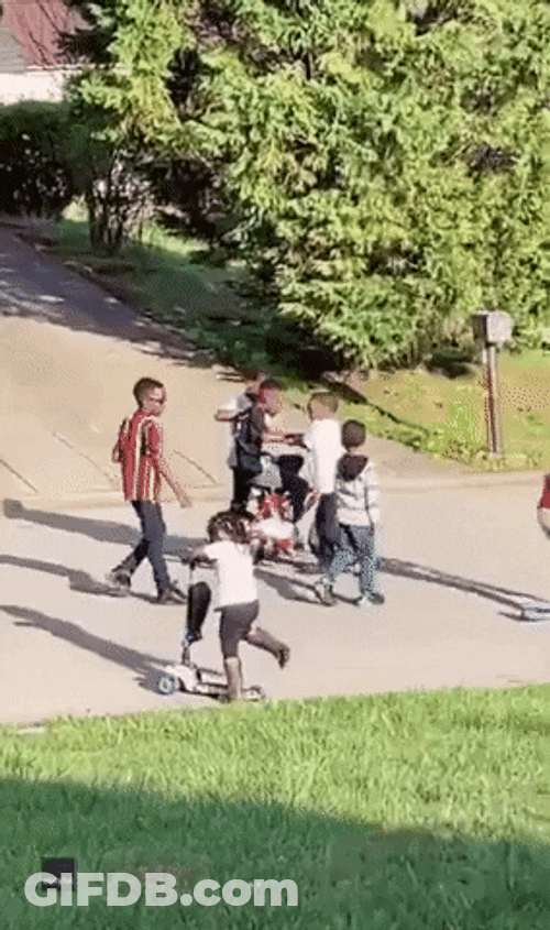 Kids Teaching Their Friend Riding Bike GIF