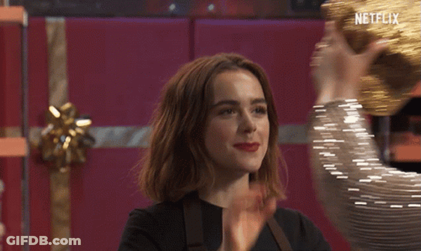 Kiernan Shipka Receiving Chef Hat GIF