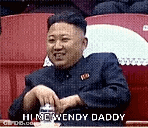 Kim Jong Un Sitting In Stadium With Water GIF