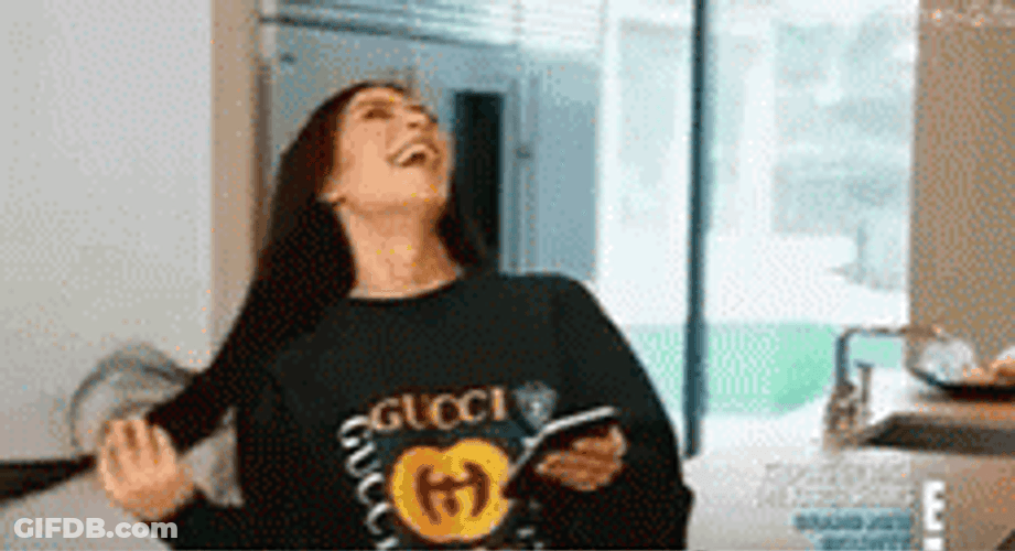 Kim Kardashian Laughing Hair Flip GIF