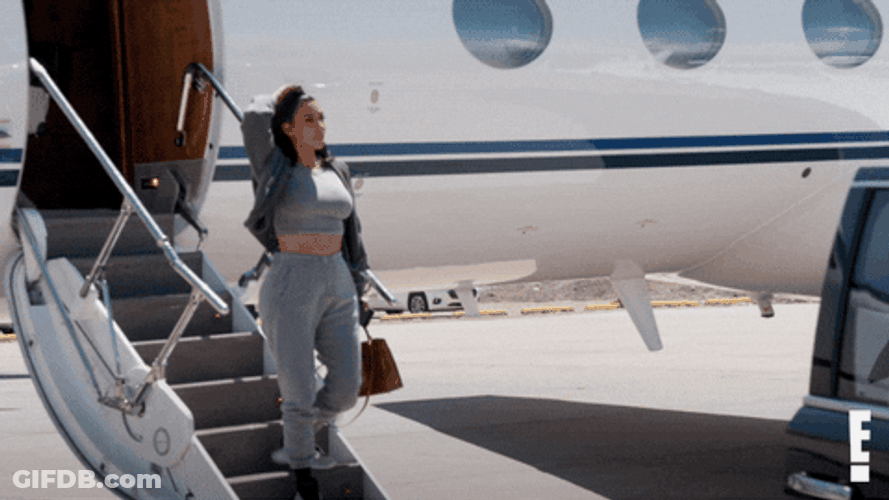 Kim Kardashian Plane Touch Down GIF