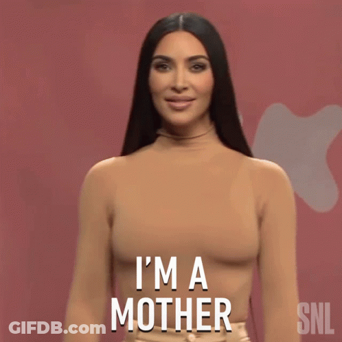 Kim Kardashian Says I 'M A Mother In Front Of A Pink Background GIF