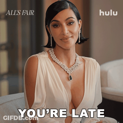 Kim Kardashian White Dress And You're Late Necklace GIF