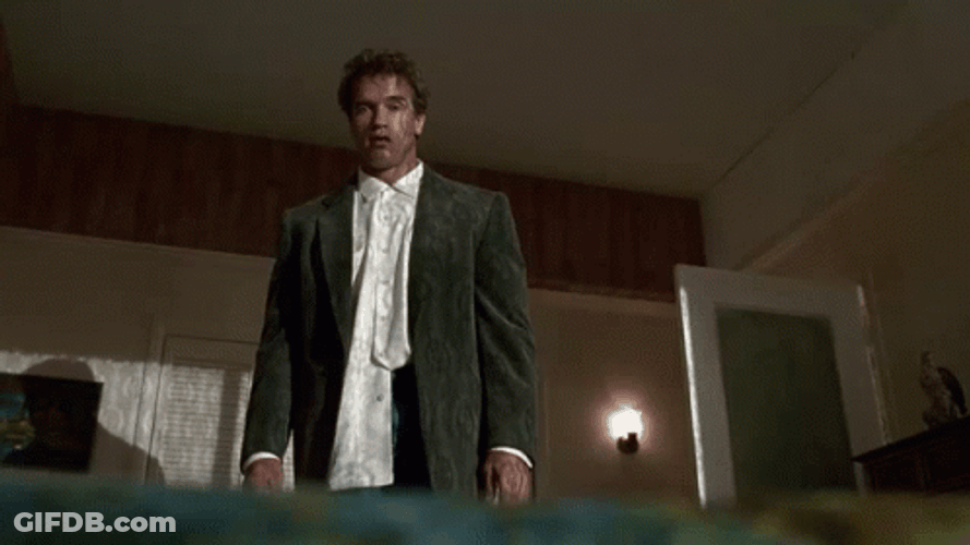 Kindergarten Cop Detective John Kimble Falling Onto Bed GIF