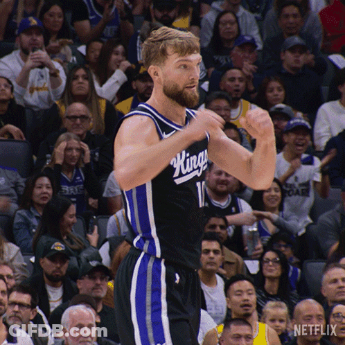 King Basketball Player Flexing Muscles GIF