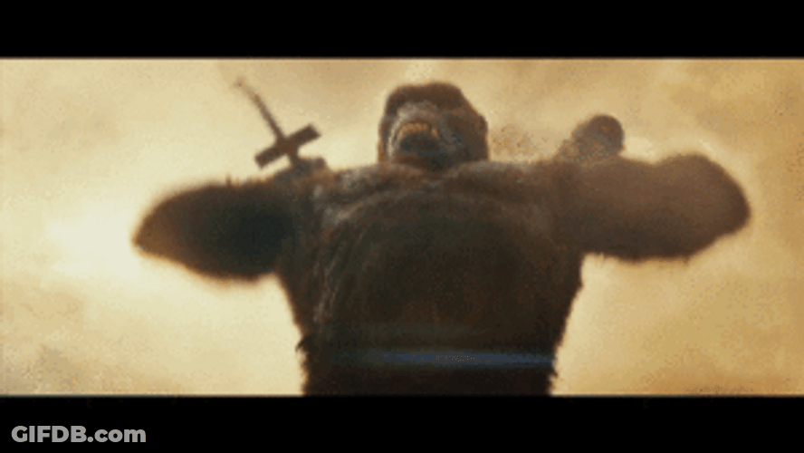 King Kong Destroying Choppers From Sky GIF